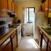 The galley kitchen in Anne and Jonathan Awori's apartment in Northwood Community Apartments. Melanie Maxwell | AnnArbor.com